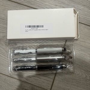 NWT pen set with laser/flashlight